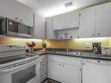Charming one-bedroom, 1.5 bath condo located in the desirable - photo 23
