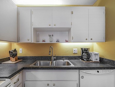 Charming one-bedroom, 1.5 bath condo located in the desirable - photo 24