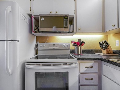 Charming one-bedroom, 1.5 bath condo located in the desirable - photo 25