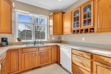 SOUGHT AFTER STAND ALONE CONDO IN SUMMIT TOWNSHIP! Striking curb