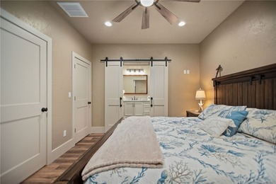 Custom-built barndominium blending charm with modern finishes - photo 18