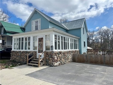 Step into timeless charm with this beautifully maintained - photo 1