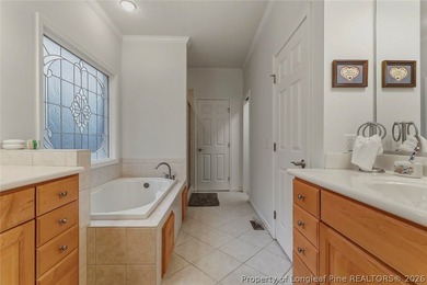 Nestled on a beautifully landscaped 1.17-acre lot in a lovely - photo 25