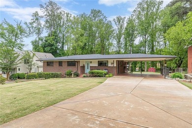 A classic brick ranch, reimagined with intention and scale, set - photo 4