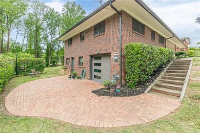 A classic brick ranch, reimagined with intention and scale, set - photo 6