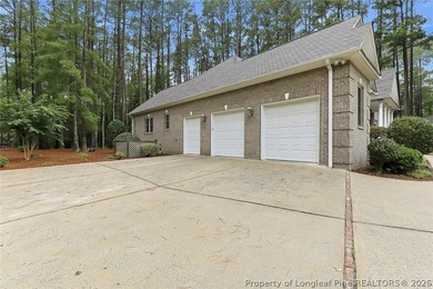 Nestled on a beautifully landscaped 1.17-acre lot in a lovely - photo 38