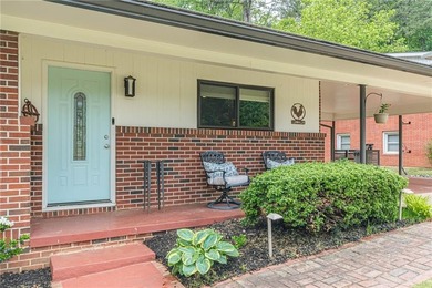 A classic brick ranch, reimagined with intention and scale, set - photo 8