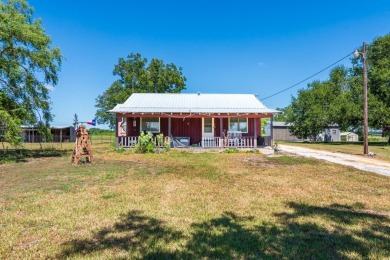 WOW! ENJOY THIS 3 BR/2 BA WATERFRONT HOME ON .99 ACRE WITH VIEWS - Lake Home Sale Pending in Mathis, Texas