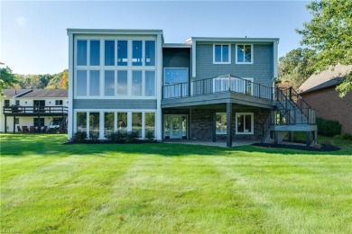 Custom built, one of a kind, lake front home on a flat lot! Set - Lake Home For Sale in Malvern, Ohio