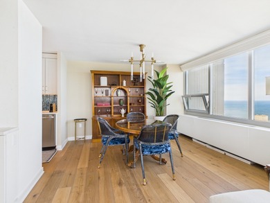 BREATHTAKING LAKEFRONT PARADISE IN THE SKY - A 3 BEDROOM, 3 BATH