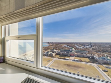 BREATHTAKING LAKEFRONT PARADISE IN THE SKY - A 3 BEDROOM, 3 BATH