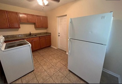 Income-producing triplex located at 182 W 34th Street, Riviera - photo 4