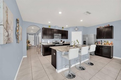 Welcome to this stunning 4-bedroom, 2-bath home located in a - photo 7