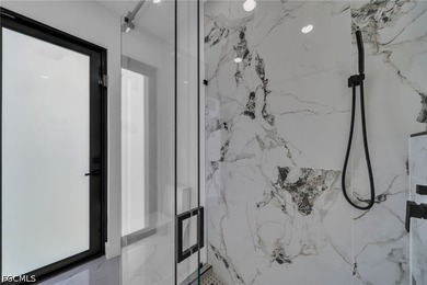 Step into modern Florida luxury in this brand-new 2026-built - photo 31