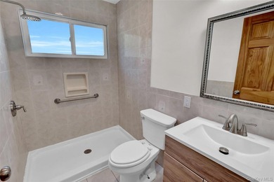 Lovely Patchogue Living! Enjoy This Beautifully Designed And - photo 11