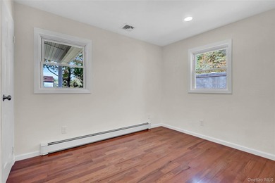 Lovely Patchogue Living! Enjoy This Beautifully Designed And - photo 12