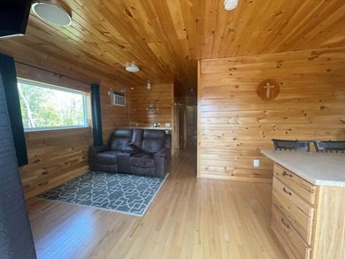 Private and economical 2 bedroom home, sits on 4.01 +/- acres - photo 8