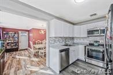 Beautifully redone ranch featuring a spacious living room - photo 9