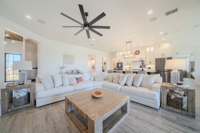 Welcome to elevated living in this stunning custom-built home - photo 5