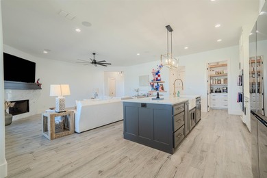 Welcome to elevated living in this stunning custom-built home - photo 7