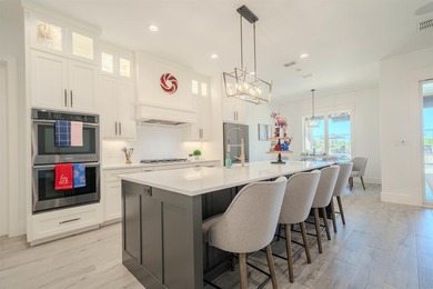Welcome to elevated living in this stunning custom-built home - photo 8