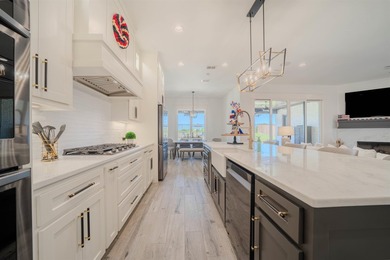 Welcome to elevated living in this stunning custom-built home - photo 10