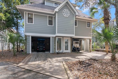 Boasting extensive views of Bald Head's serene estuary, this - photo 1
