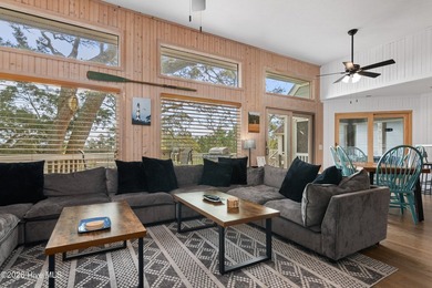 Boasting extensive views of Bald Head's serene estuary, this - photo 3