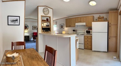 Enjoy lake and mountain views from your covered deck, a - photo 11