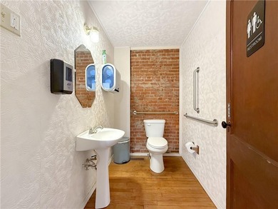 Welcome to a rare opportunity in downtown Higginsville--a