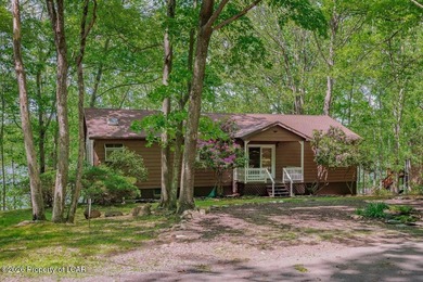 Attractive 3BR 2Bth cedar sided lakefront ranch offers stunning - photo 1