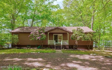Attractive 3BR 2Bth cedar sided lakefront ranch offers stunning - photo 3