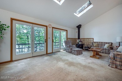 Attractive 3BR 2Bth cedar sided lakefront ranch offers stunning - photo 7