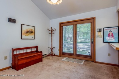 Attractive 3BR 2Bth cedar sided lakefront ranch offers stunning - photo 8