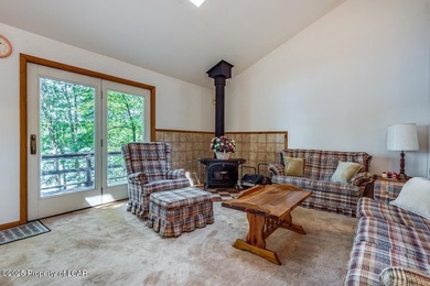 Attractive 3BR 2Bth cedar sided lakefront ranch offers stunning - photo 9
