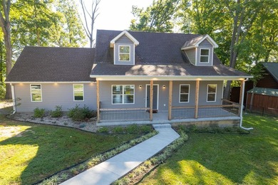 The lake is calling! Discover tranquility & luxury in this - photo 1