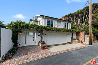Located within the exclusive guard-gated community of Malibu - photo 1