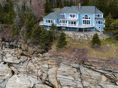 Set on Maine's bold coast, this four-bedroom - photo 3