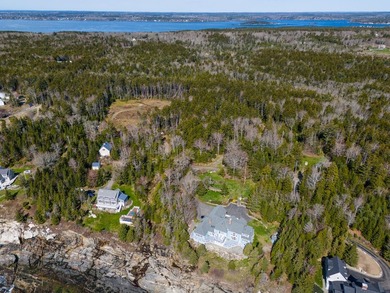 Set on Maine's bold coast, this four-bedroom - photo 7