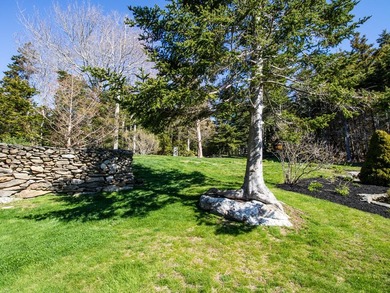 Set on Maine's bold coast, this four-bedroom - photo 10