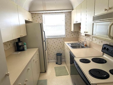 Charming first-floor end-unit in the Active Adult community of - photo 11
