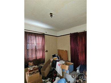 CALLING ALL CASH BUYERS TO THIS OVERSIZED DIAMOND IN THE ROUGH - photo 34