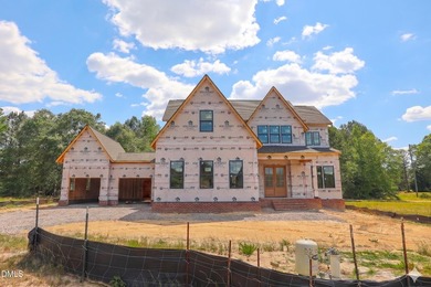 Custom-built by Ken Harvey Homes, with a RARE 4-CAR GARAGE! - photo 1
