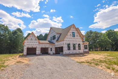 Custom-built by Ken Harvey Homes, with a RARE 4-CAR GARAGE! - photo 2
