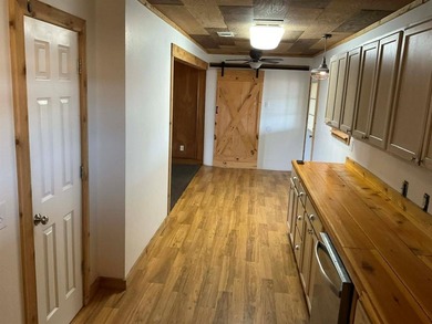 Charming 3 bedroom, 2 bath home situated on approximately .41