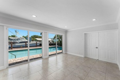 Experience luxury waterfront living in the prestigious Cove of - photo 13
