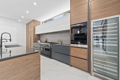 Experience unparalleled modern waterfront luxury in prestigious - photo 13
