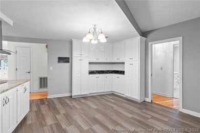 Welcome to 88 Traceway, a spacious all-brick, single-story - photo 18