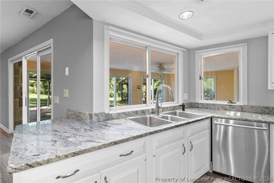 Welcome to 88 Traceway, a spacious all-brick, single-story - photo 20