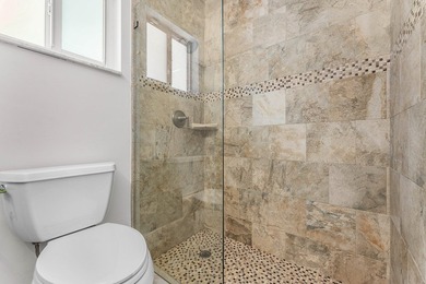 Experience luxury waterfront living in the prestigious Cove of - photo 20
